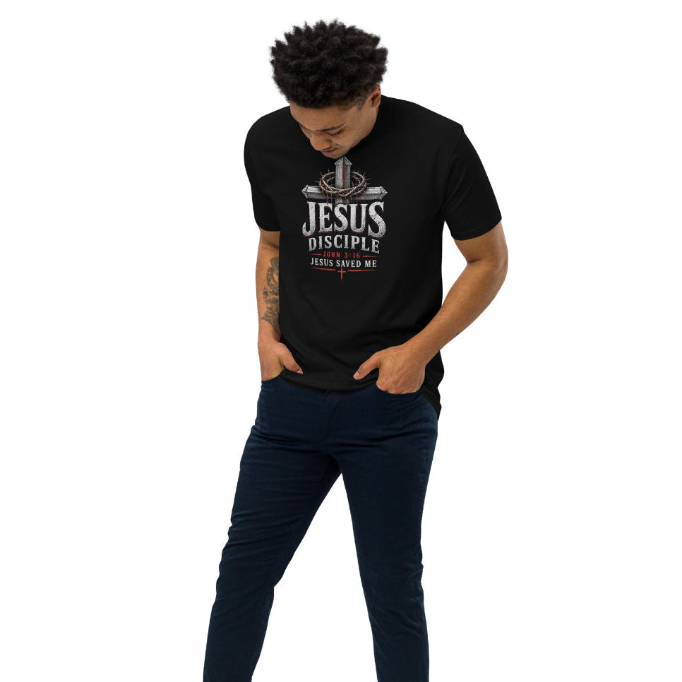 Person wearing a black t-shirt with a logo and dark pants on a white background
